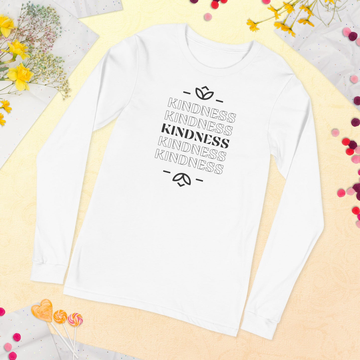 White long sleeve shirt with "kindess" x5 in black writing.
