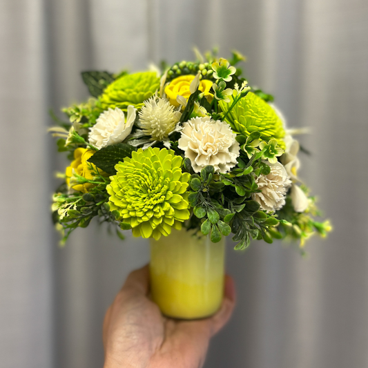Green, yellow, and white Lemon Lime bouquet on "Fruit Medley" scented candle. 